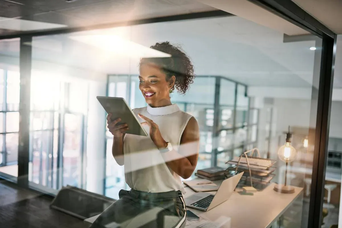 A person smiling whilst working